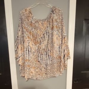 Cute blouse with wide flowing sleeves.